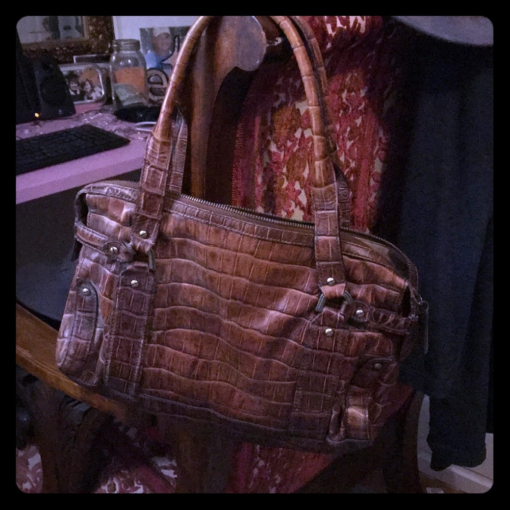 Brown leather Cole Haan purse. Great condition!